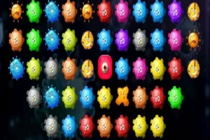 Bule colorate cu fețe și expresii diverse sunt aranjate pe un fundal întunecat