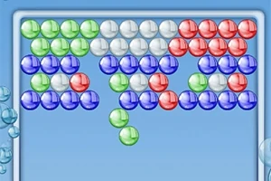 Bile colorate dispuse în rânduri de diferite culori pe un fundal albastru