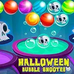 Bile colorate și cranii desenate, alături de textul Halloween Bubble Shooter, pe un fundal albastru