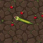 Un șarpe verde pixelat se strecoară printre câteva mere roșii pe un fundal de piatră