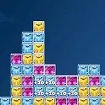 Blocuri colorate în albastru, galben și roz așezate într-un model de tip puzzle pe un fundal albastru